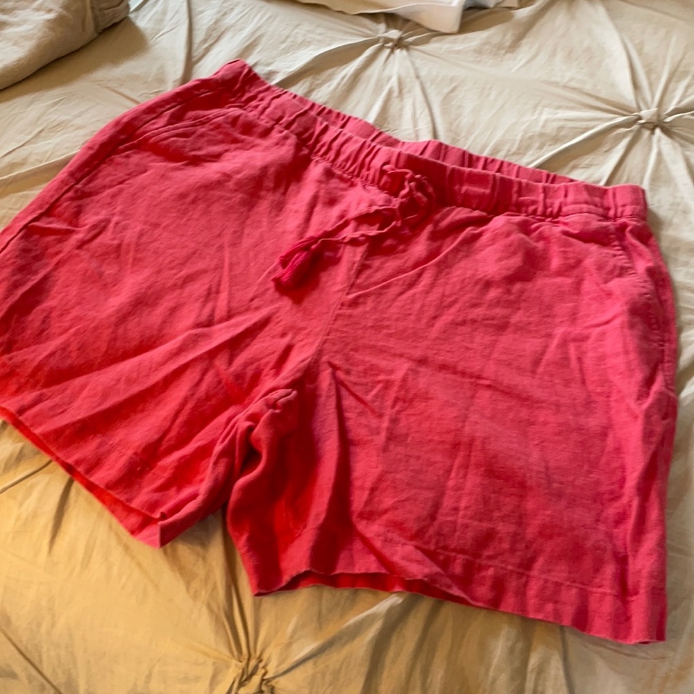 Women’s orange shorts.